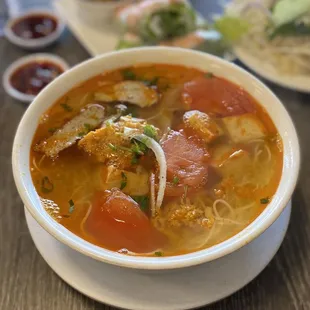 14. Vietnamese Crab Noodle with tomato and tofu Bun Rieu