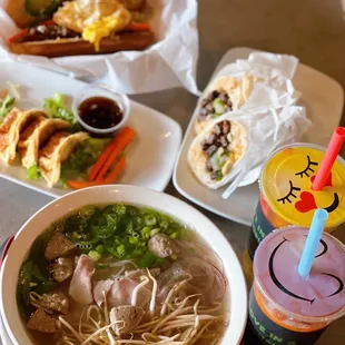 a bowl of soup, a sandwich, and a drink