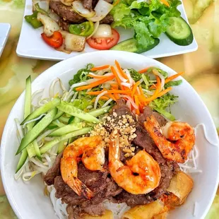 two plates of asian food