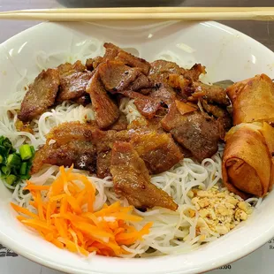 Tasty Bun Thit Nuong Cha Gio (marinated grilled pork over rice vermicelli w/ egg roll)