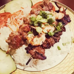 Pork, shrimp, meatballs over rice.