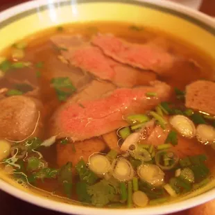 P4.Pho Tai Nam Bo Vien - Noodle soup with steak, flank, and meatball
  
  small bowl - $7.65 w/o tax