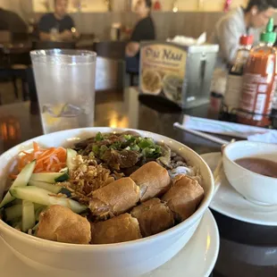 Grilled pork vermicelli and spring rolls