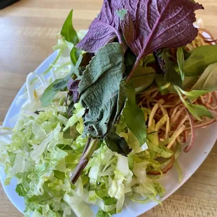 Why is lettuce being served with hot soup? What happened to cabbage? Shiso is wilted as well.