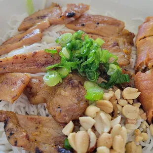 42a grilled pork vermicelli with egg rolls, delicious