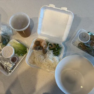 Seafood pho, spring rolls