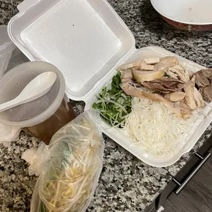 a variety of food in plastic containers