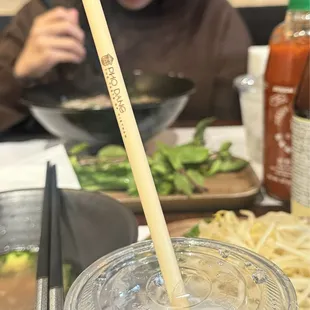 Bamboo straw with their logo on it. How fancy!