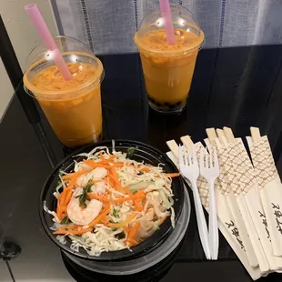 two drinks and a bowl of noodles