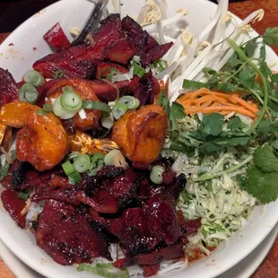 Combination vermicelli with chicken, shrimp, and pork.  All very tender. Lots of flavor. This place leans toward caramel/sweet on the meats.