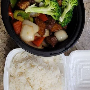 Shaky beef: beef cubes, potatoes, bell peppers, onions and broccoli. Steamed rice.