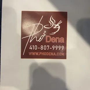 a sign for pho dena