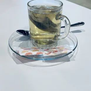 a cup of tea on a saucer