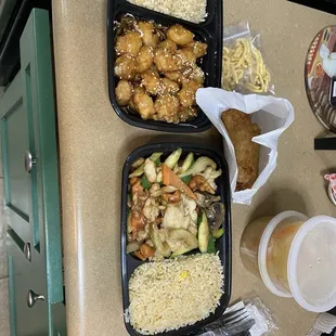 Two take out lunches...sesame chicken and cashew chicken, soup, egg rolls.