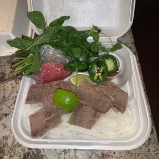 Steak and brisket pho carry out