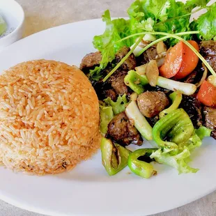Fillet mignon Shaken Beef with Tomatoe Rice.