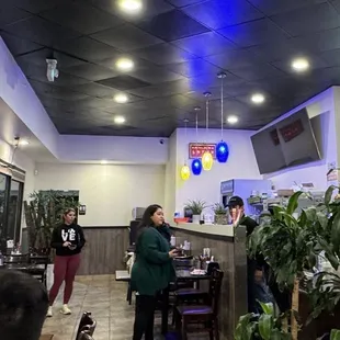 a group of people in a restaurant