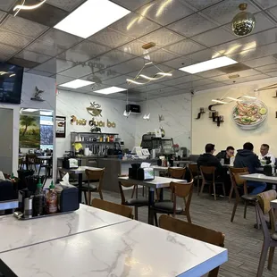 Inside of restaurant at 2 PM on weekday.