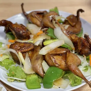 a plate of chicken and vegetables