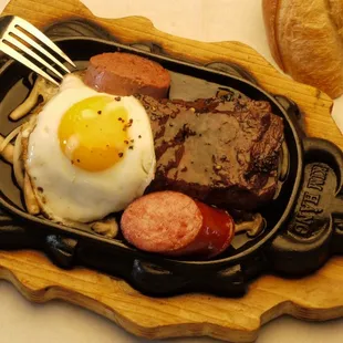 steak, eggs, and sausage