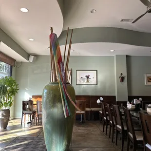 a dining room with tables and chairs