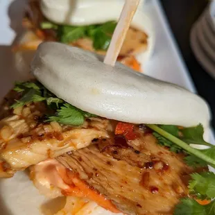 Chicken Bao... Asked for extra spicy. Chicken was chewy...CHEWY! 1/5 No spice whatsoever. Bland!