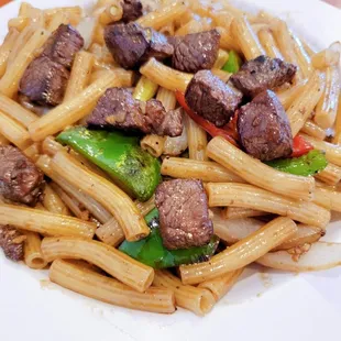 Shaken beef filet mignon with macaroni ( nuoi xao bo luc lac)