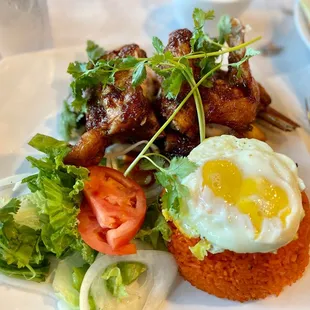 Com Ga Roti: seasoned chicken with red rice and egg