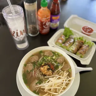 Filet mignon pho w/ extra meatballs and Grilled pork salad rolls