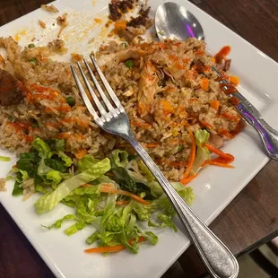 a plate of rice and vegetables