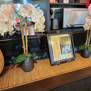 flowers and a picture of a man