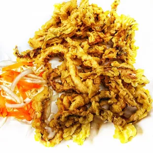 #5 Calamari $9.99 Deep fried squids served with sweet and sour sauce.