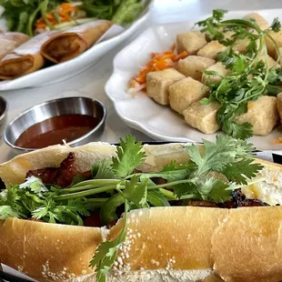 BBQ Pork Bahn Mi, crispy tofu and egg rolls
