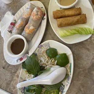 Appetizers: Salad Rolls and crispy Egg rolls (only get 2 even though the photo on menu shows four)