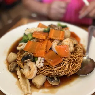 Crispy Egg noodles nest with Seafood and vegetables.
