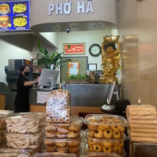 a counter with a variety of pastries