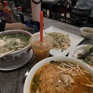 a variety of dishes of food on a table