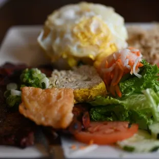62. Cơm Tấm Đặc Biệt (Steamed crushed rice w/shredded pork, grilled pork chop, egg quiche and bean curn skin)