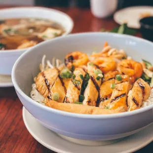two bowls of food on a table