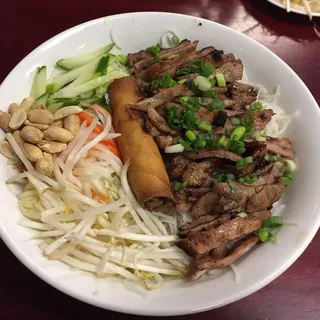#54 Grilled Pork, Egg Rolls & Vegetable on Thin Vermicelli