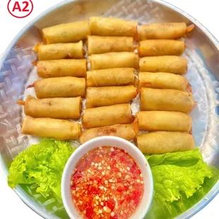 Crispy, golden spring rolls packed with savory fillings! Bursting with flavor and paired with tangy sauces, they're the perfect snack or app
