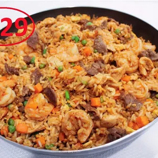 Fluffy fried rice with a perfect mix of veggies, savory flavors, and your choice of meat. A flavorful, satisfying dish!