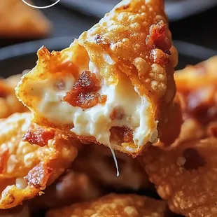 Crispy, golden wontons filled with creamy cheese, fried to perfection. Perfectly crispy on the outside and cheesy inside!