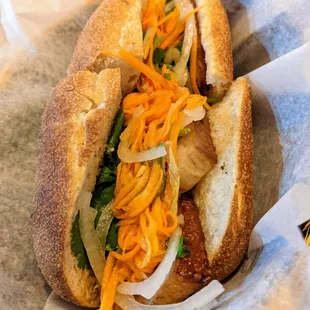 Vietnamese Sandwich (Banh Mi). $7. Toasted baguette with mayonnaise, cucumber, onion, carrot pickles, jalapeno, cilantro, and pork belly.