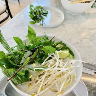 a bowl of noodles and vegetables