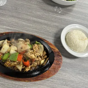 15. Ginger or Lemongrass Chicken with Rice, excellent, the dish comes out so hot and sizzling.
