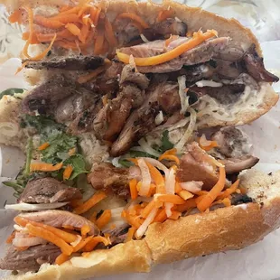 Combination Banh mi with only dry chicken and beef, almost no cilantro, and no jalapeños