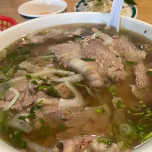 Brisket and freshly made meatball pho.