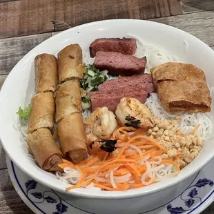 B: Rice Vermicelli With Fresh Pork Rind And Bbq Shrimp and egg rolls