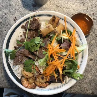 Beef, shrimp and egg roll bun
